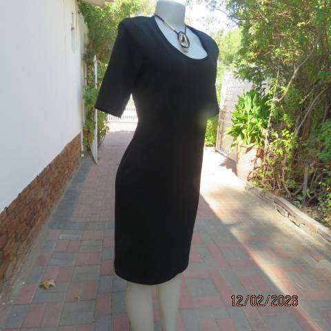 Very black textured stretch polyester slip over shift dress with long short sleeves. Size 36