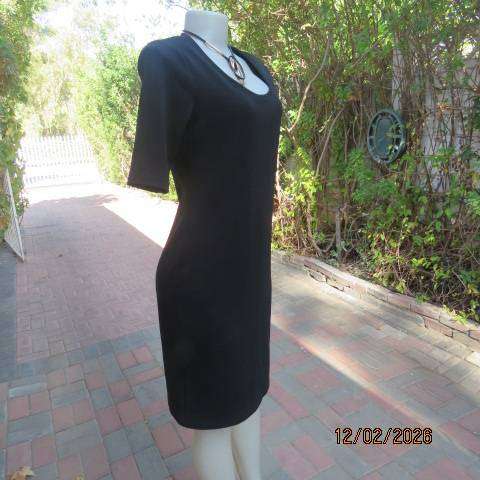 Very black textured stretch polyester slip over shift dress with long short sleeves. Size 36