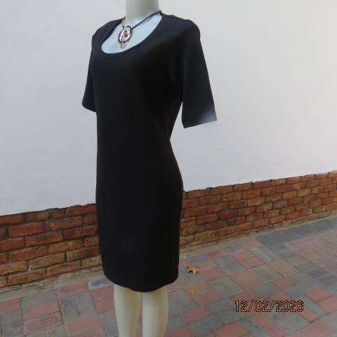 Very black textured stretch polyester slip over shift dress with long short sleeves. Size 36