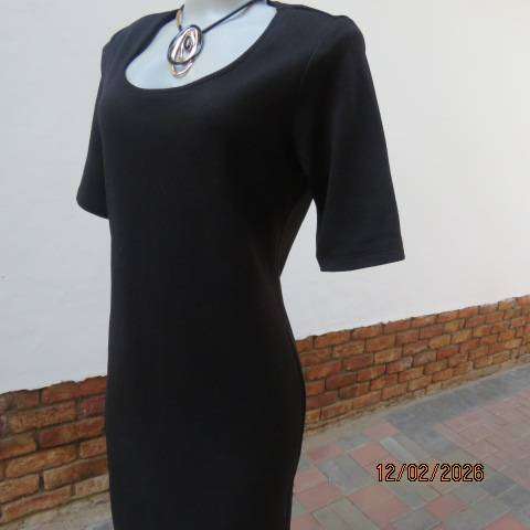 Very black textured stretch polyester slip over shift dress with long short sleeves. Size 36