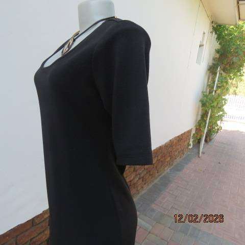 Very black textured stretch polyester slip over shift dress with long short sleeves. Size 36