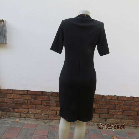 Very black textured stretch polyester slip over shift dress with long short sleeves. Size 36