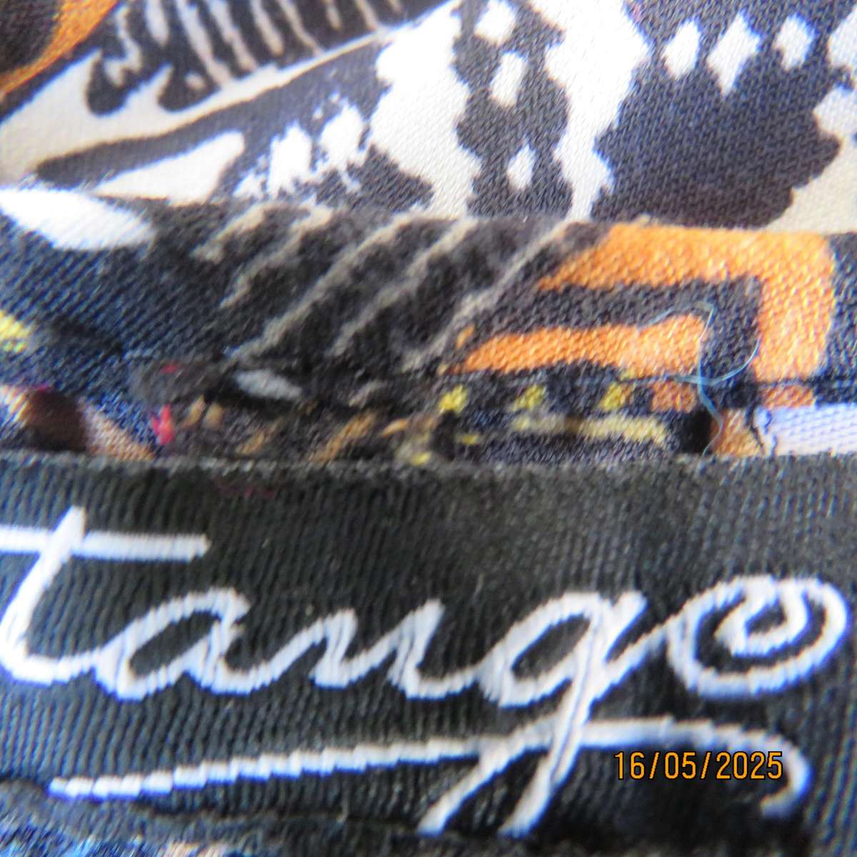 Ethnic patterned maxi polyester sleeveless dress. Elasticated waist. Size 34.