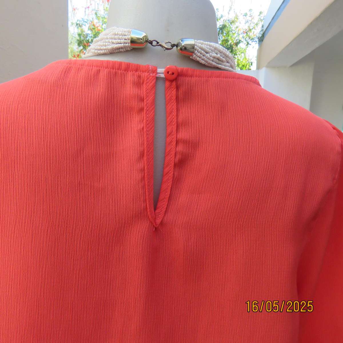 Crimson slip over crinkled polyester size 34 top by OR. Frilled sleeves.