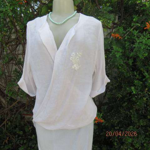 OR white crinkled poly-viscose top with unique crossover front and elbow sleeves, size 36