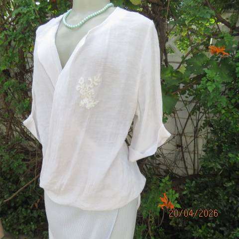 OR white crinkled poly-viscose top with unique crossover front and elbow sleeves, size 36