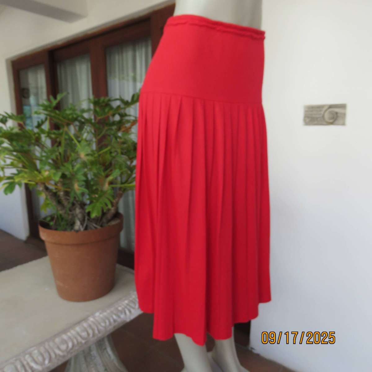 Rose red stretch cotton knife pleated skirt with yoked elasticated waist. Size 40
