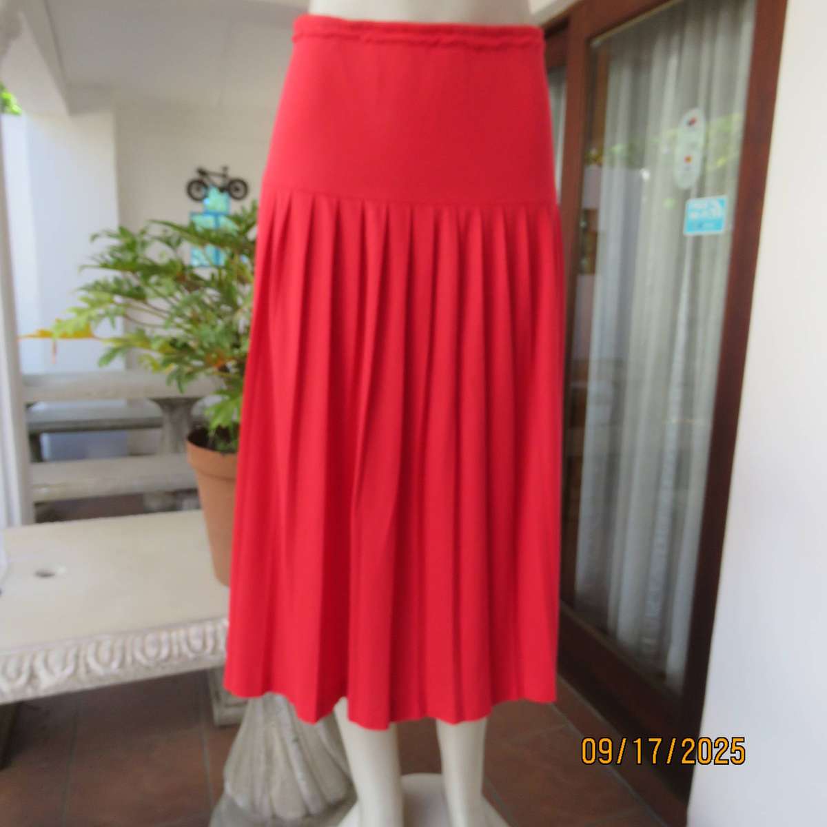 Rose red stretch cotton knife pleated skirt with yoked elasticated waist. Size 40