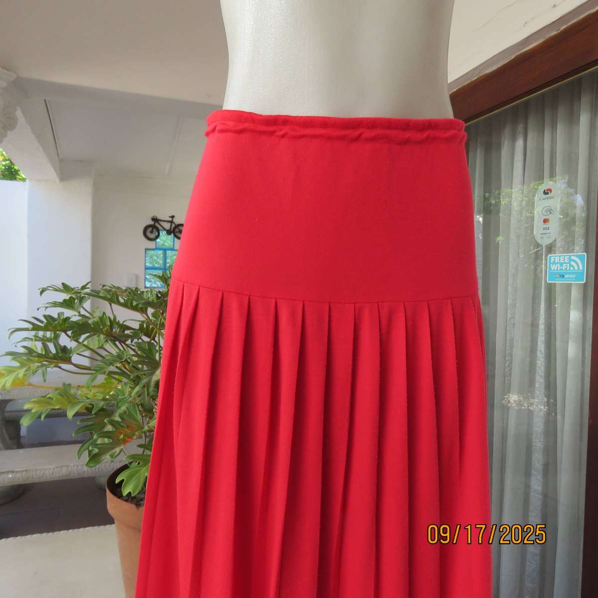 Rose red stretch cotton knife pleated skirt with yoked elasticated waist. Size 40