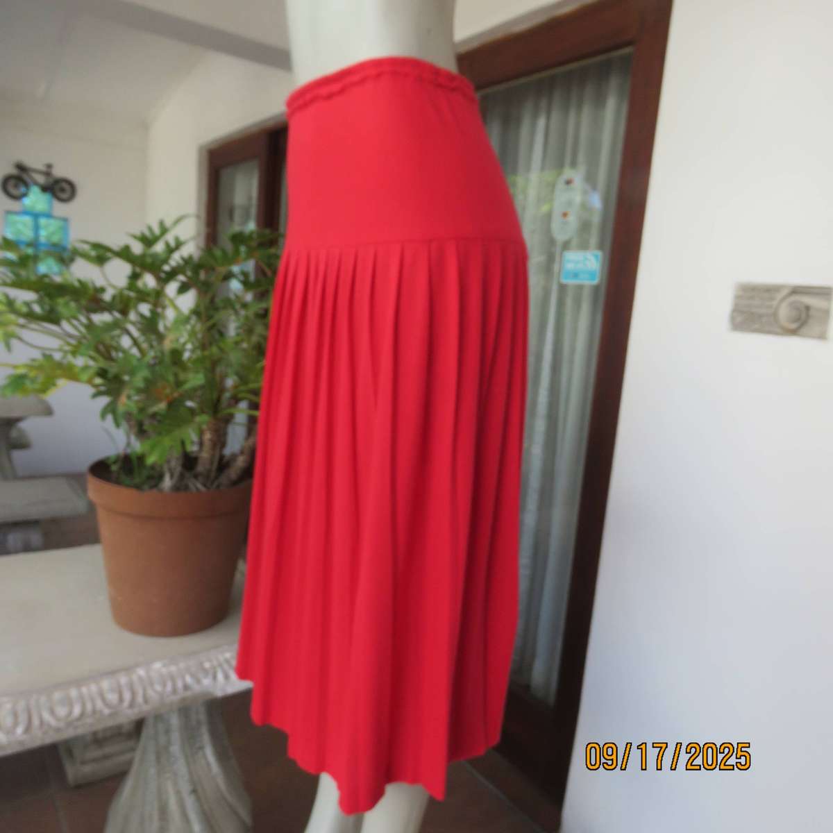 Rose red stretch cotton knife pleated skirt with yoked elasticated waist. Size 40