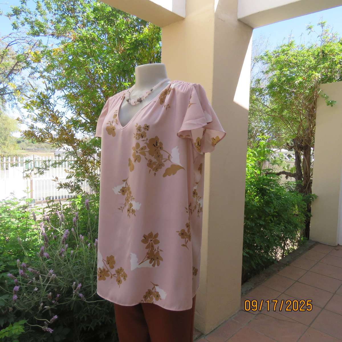 WOOLWORTHS slip over champagne peach with tan-white flowers capped sleeve top. Size 42