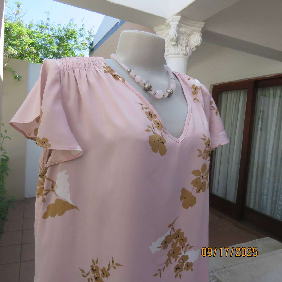 WOOLWORTHS slip over champagne peach with tan-white flowers capped sleeve top. Size 42