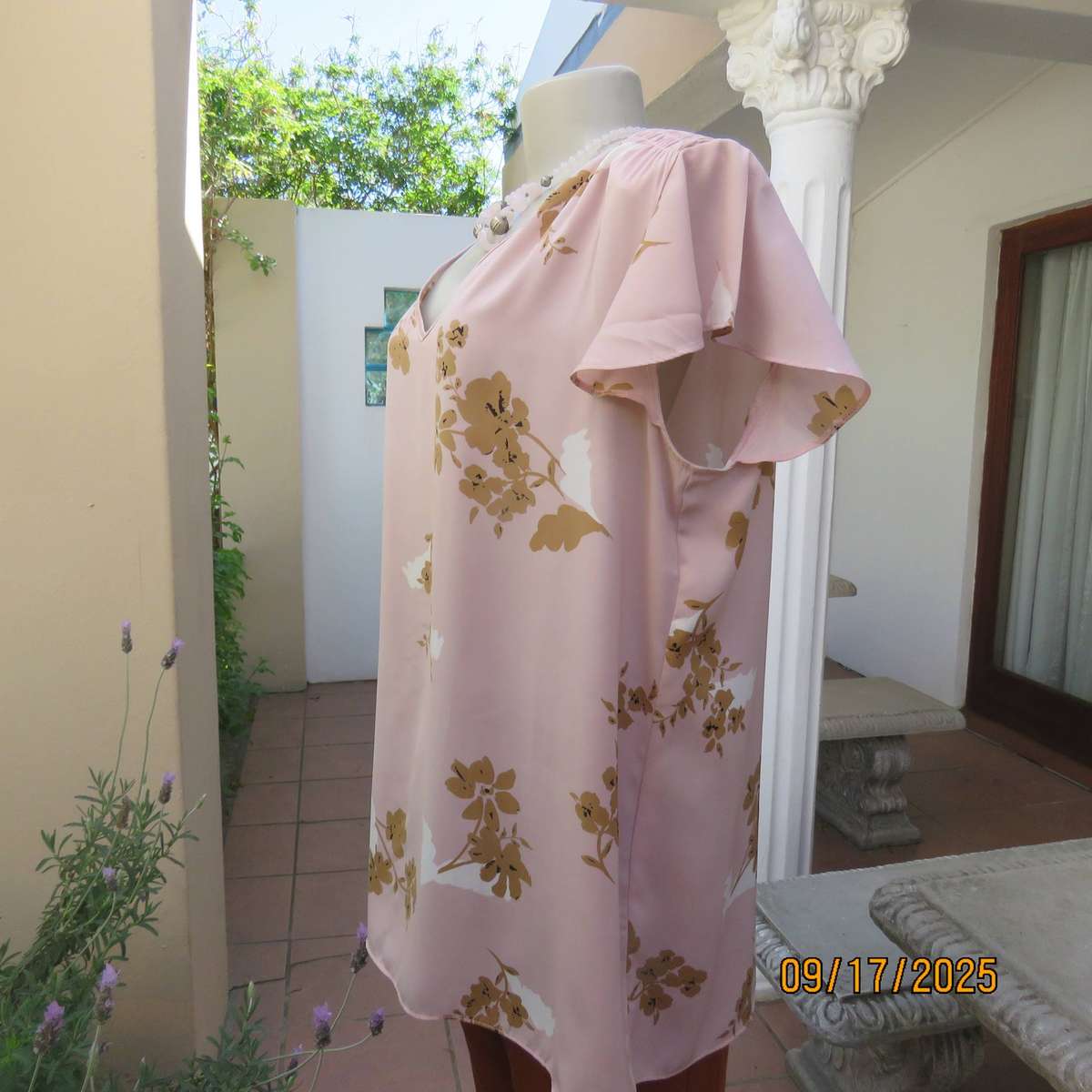 WOOLWORTHS slip over champagne peach with tan-white flowers capped sleeve top. Size 42