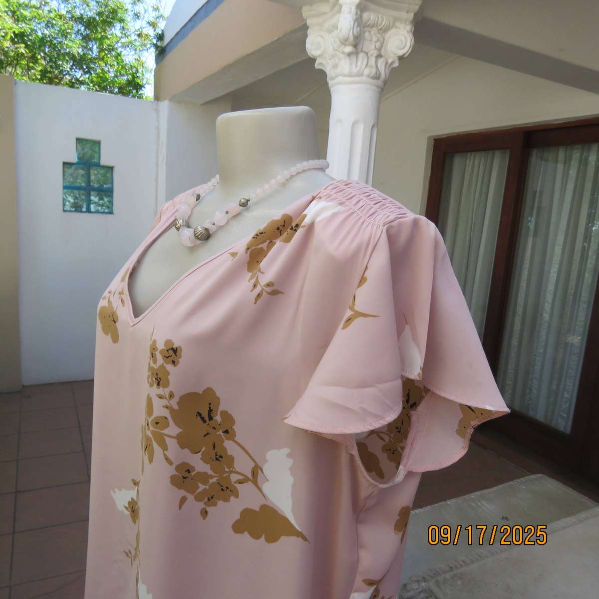 WOOLWORTHS slip over champagne peach with tan-white flowers capped sleeve top. Size 42
