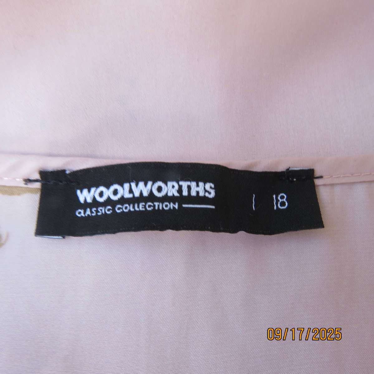 WOOLWORTHS slip over champagne peach with tan-white flowers capped sleeve top. Size 42