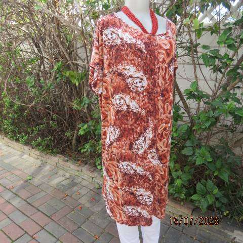 Paisley patterned rust and white with aqua accents long slip over stretch viscose top size 42-44