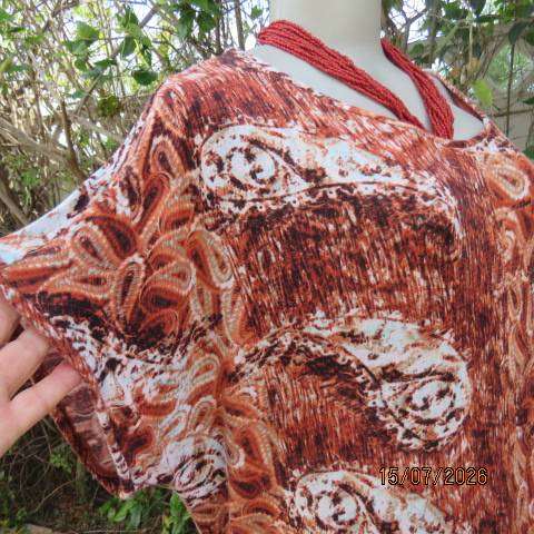 Paisley patterned rust and white with aqua accents long slip over stretch viscose top size 42-44
