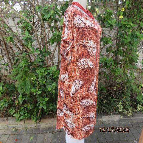 Paisley patterned rust and white with aqua accents long slip over stretch viscose top size 42-44
