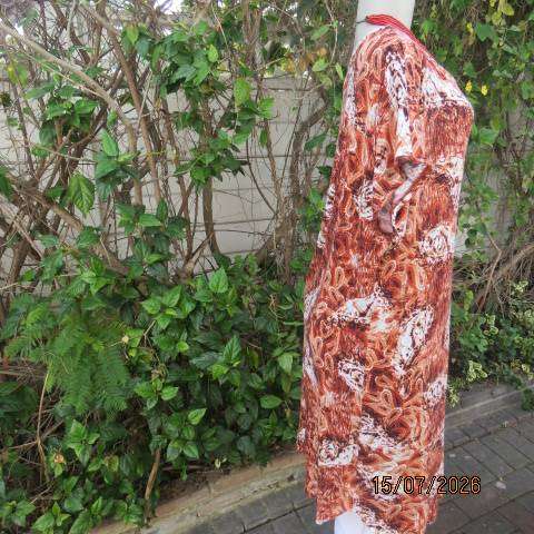 Paisley patterned rust and white with aqua accents long slip over stretch viscose top size 42-44
