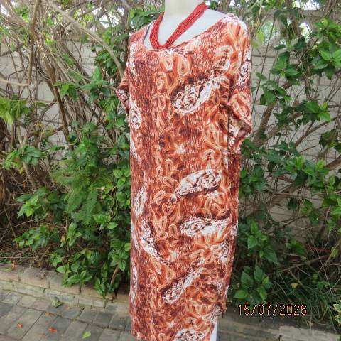 Paisley patterned rust and white with aqua accents long slip over stretch viscose top size 42-44