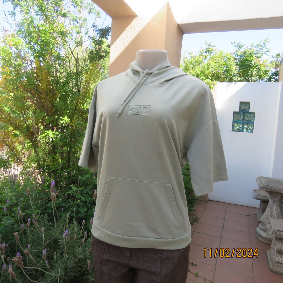 Soft mint green polycotton short sleeve hoody by NBD size 36. Kangaroo pocket. Very good cond.