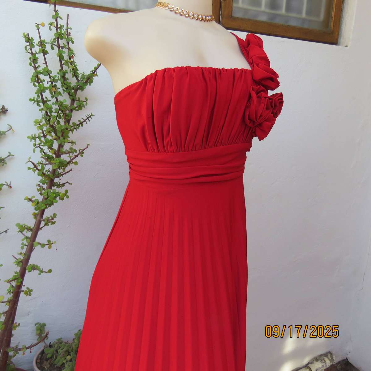 Dark red evening dress with permanent pleated bottom and 1 shoulder strap. Size 36