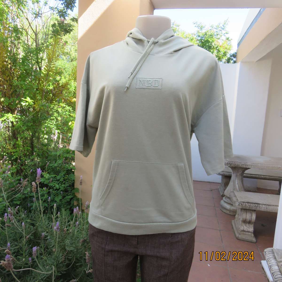 Soft mint green polycotton short sleeve hoody by NBD size 36. Kangaroo pocket. Very good cond.