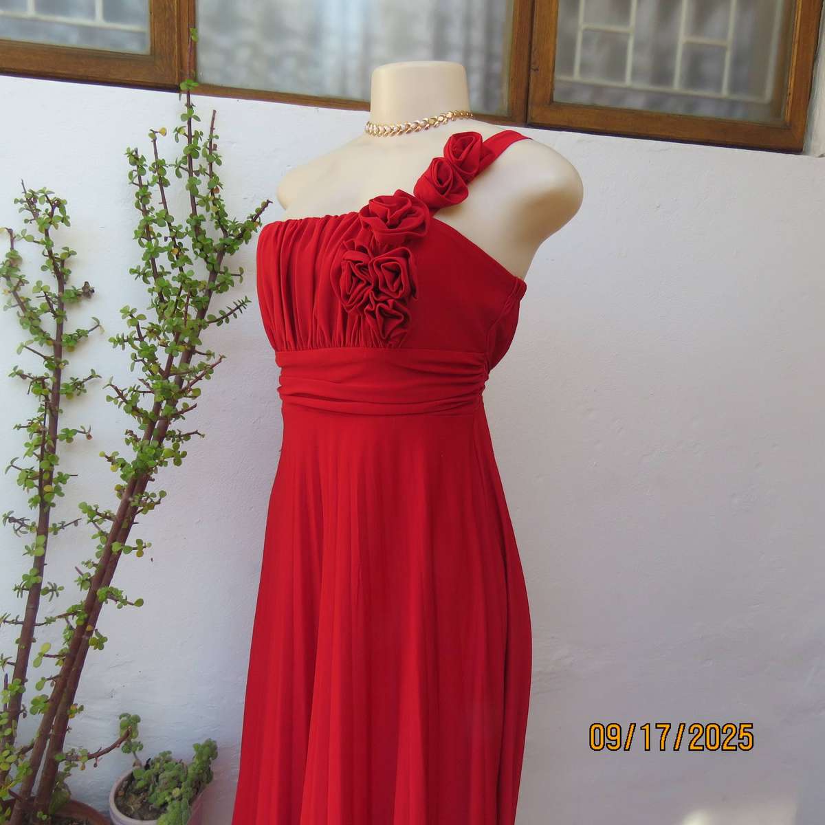 Dark red evening dress with permanent pleated bottom and 1 shoulder strap. Size 36