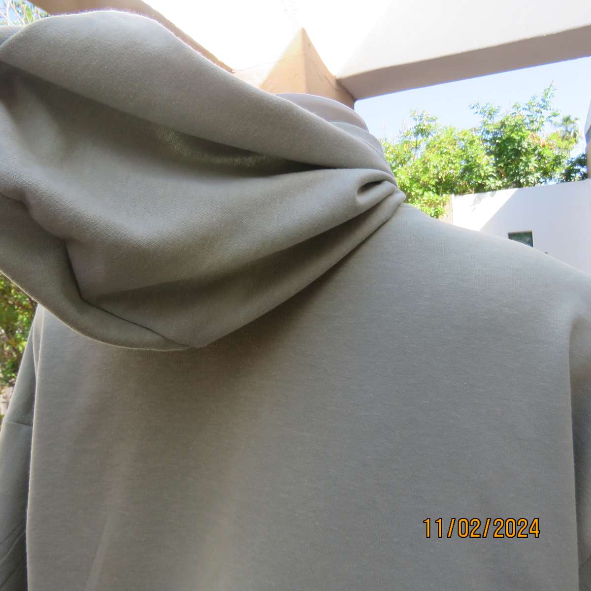 Soft mint green polycotton short sleeve hoody by NBD size 36. Kangaroo pocket. Very good cond.