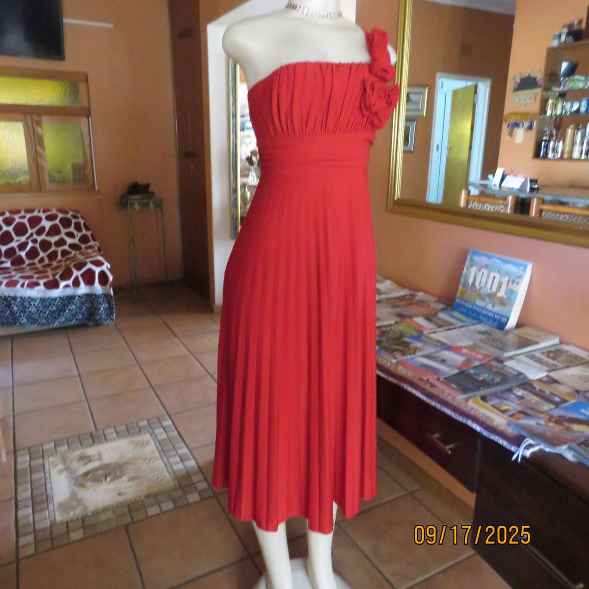 Dark red evening dress with permanent pleated bottom and 1 shoulder strap. Size 36