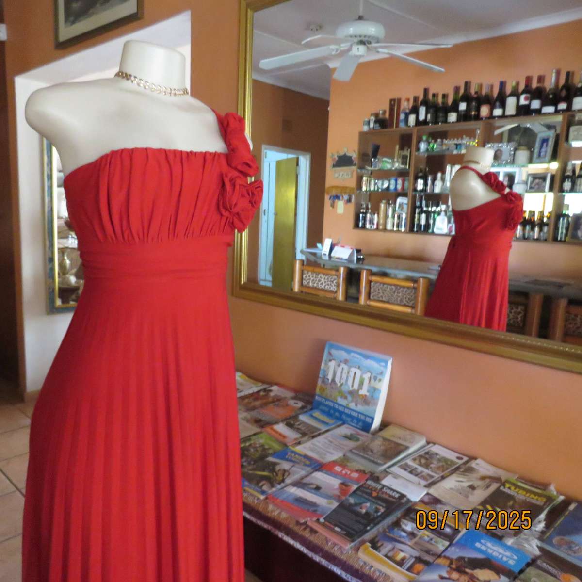 Dark red evening dress with permanent pleated bottom and 1 shoulder strap. Size 36