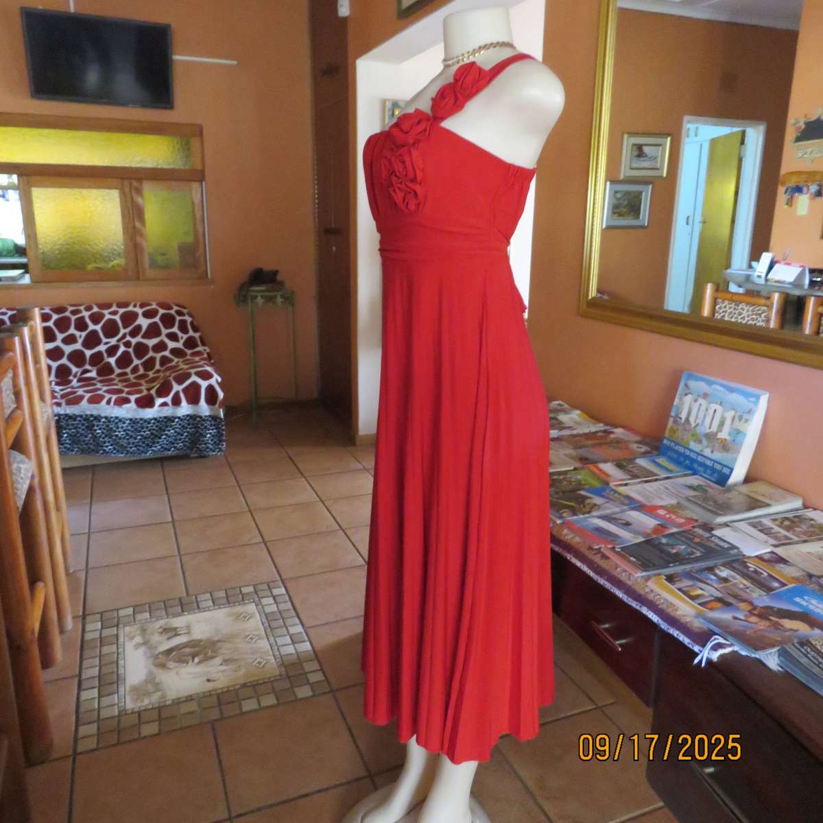 Dark red evening dress with permanent pleated bottom and 1 shoulder strap. Size 36