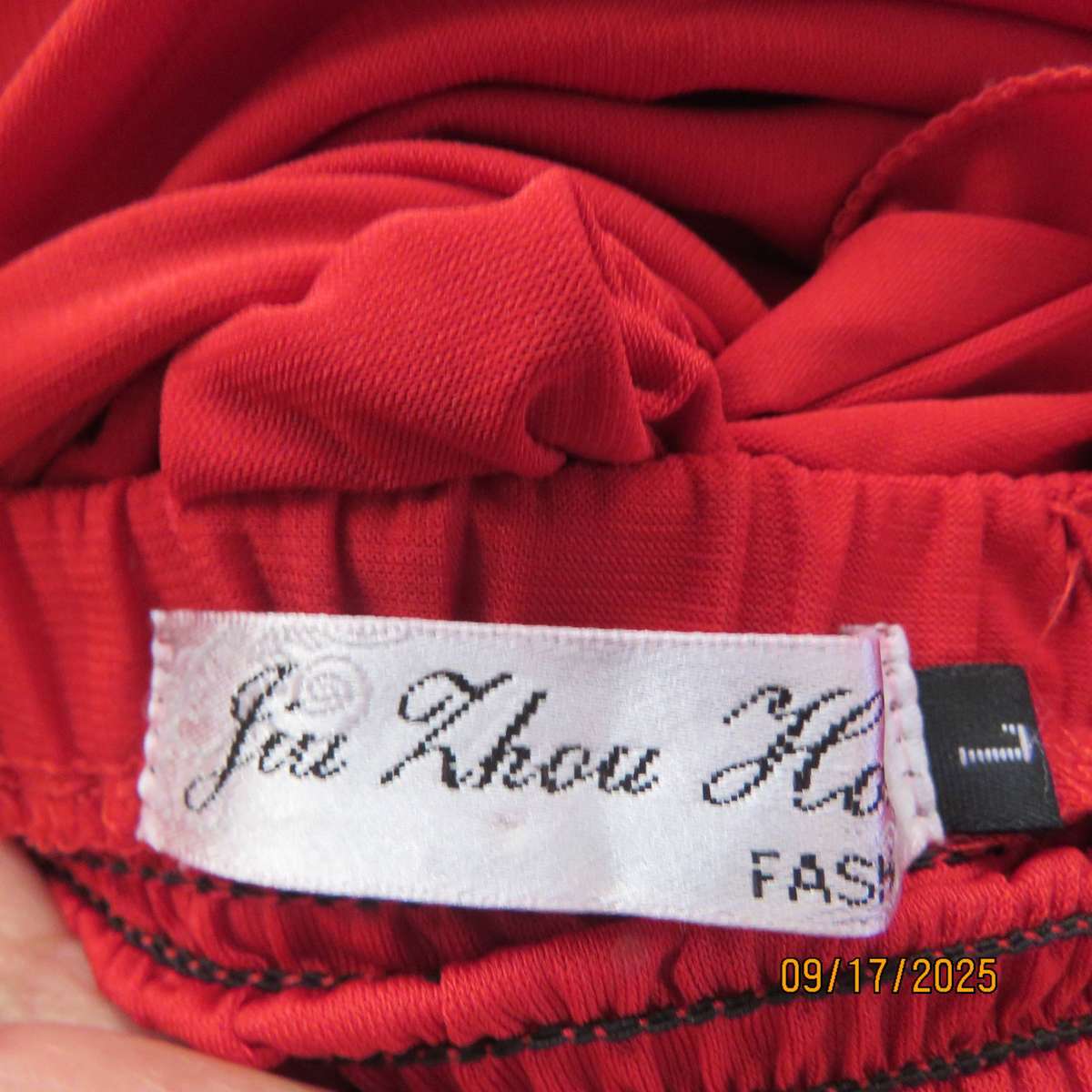Dark red evening dress with permanent pleated bottom and 1 shoulder strap. Size 36