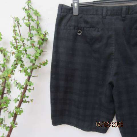 Black and light grey check polycotton men's dress shorts. Pockets back-sides. Size 40