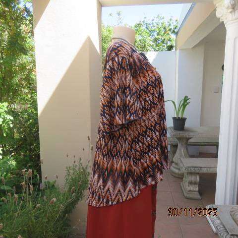 Bohemian Chic navy-orange-white horizontal printed bell sleeve polyester stretch top. Size 44