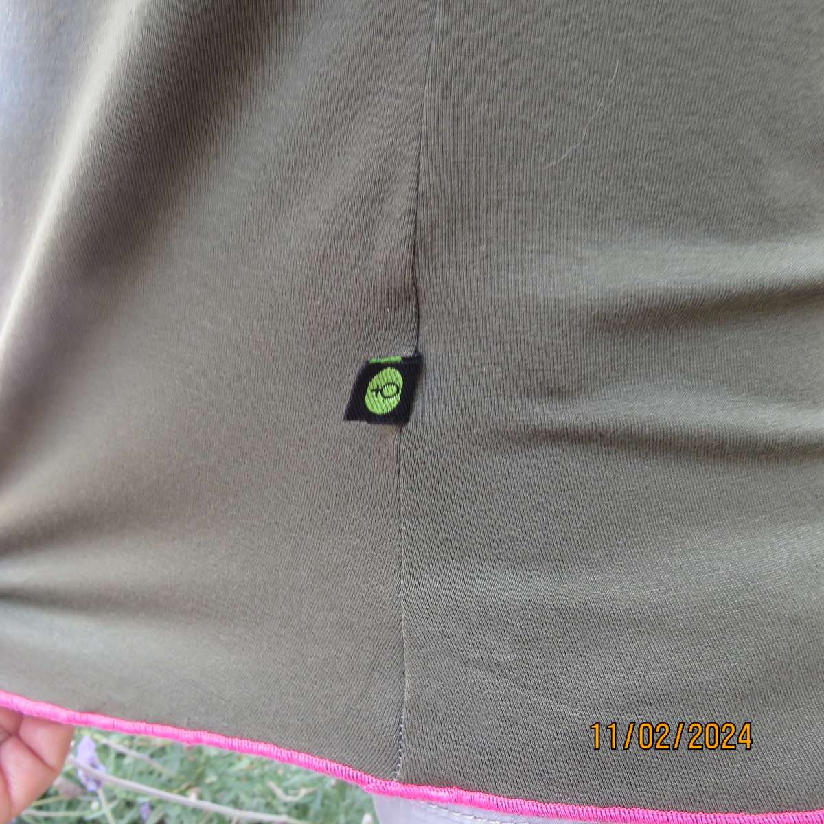 SISSY BOY olive green slip over size 32 top in stretch viscose. Pink edging. As new condition.