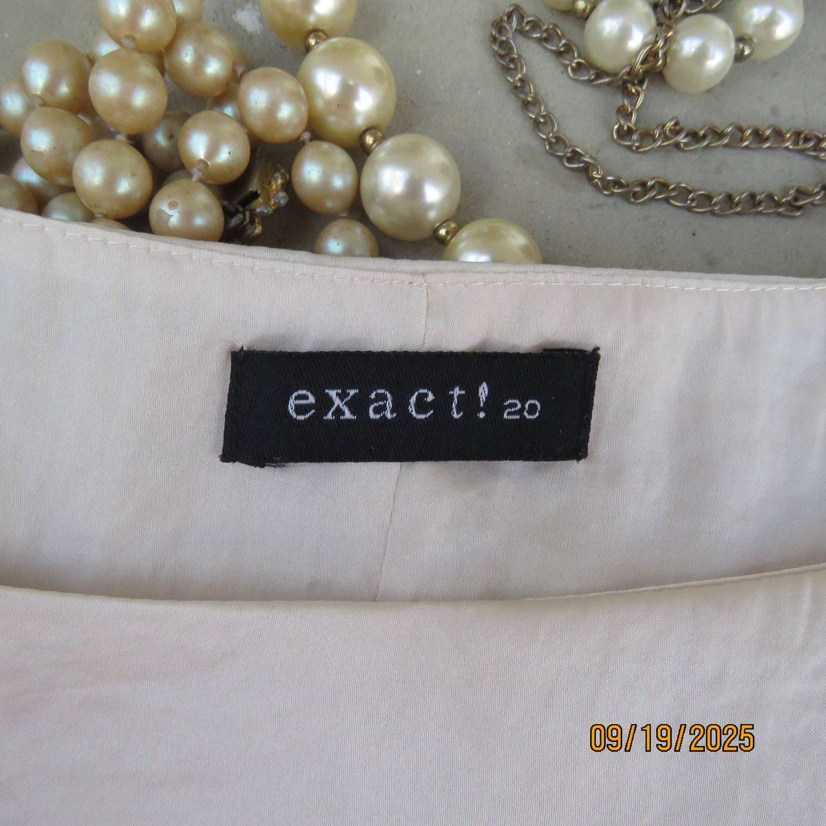EXACT soft silky shiny slip over top in cream-peach and ecru. Tiny cut-on sleeves. Size 44