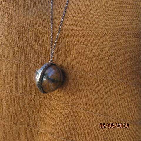 Chiastolite cross stone sphere pendant with metal band and chain