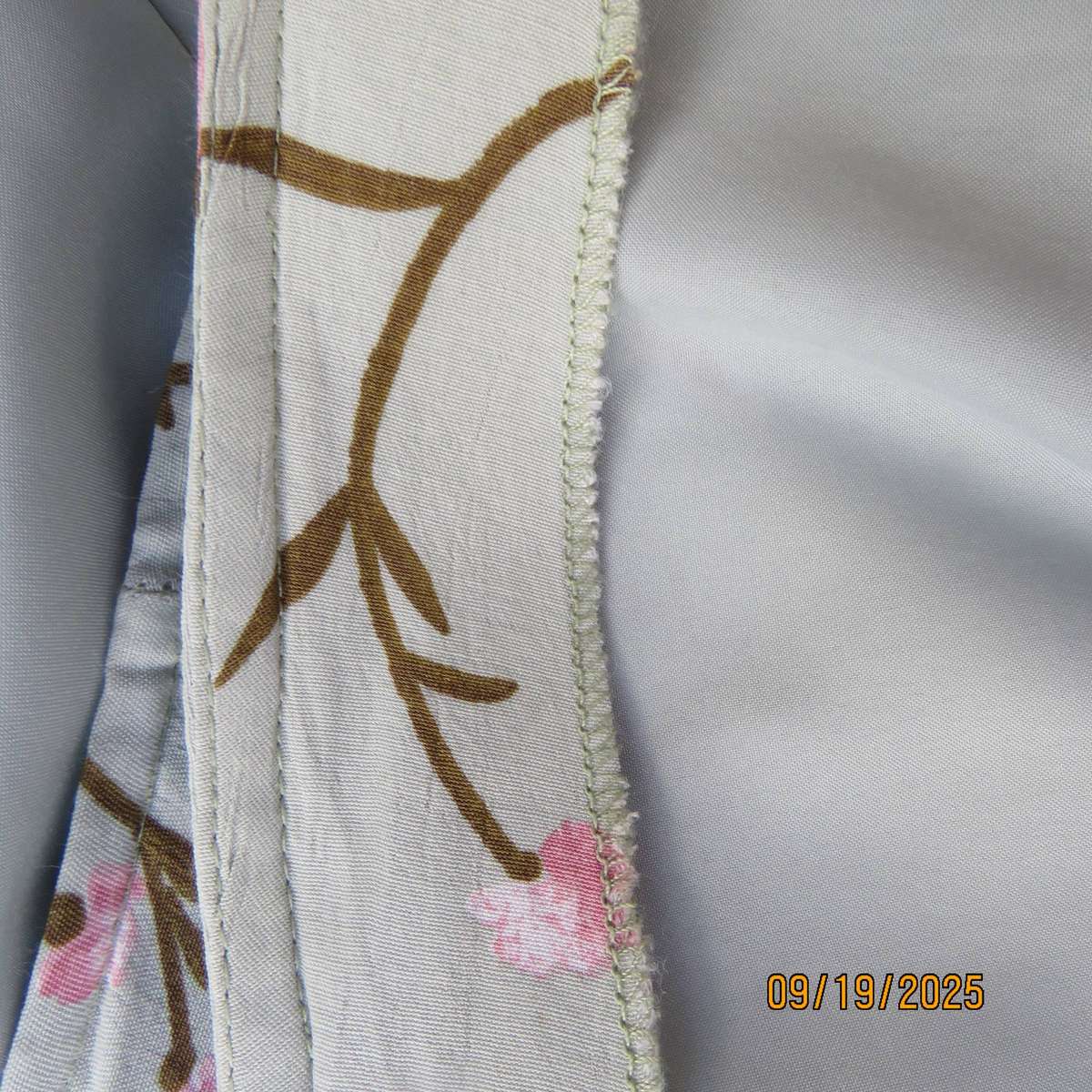 Boutique made light sage green lined pencil bandless skirt with floral print. Size 38