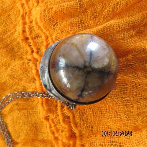 Chiastolite cross stone sphere pendant with metal band and chain