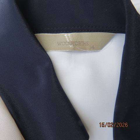 WOOLWORTHS white polyester short sleeve button down top with navy collar and trims. Size 38-40