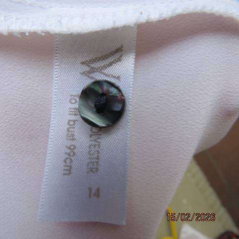 WOOLWORTHS white polyester short sleeve button down top with navy collar and trims. Size 38-40