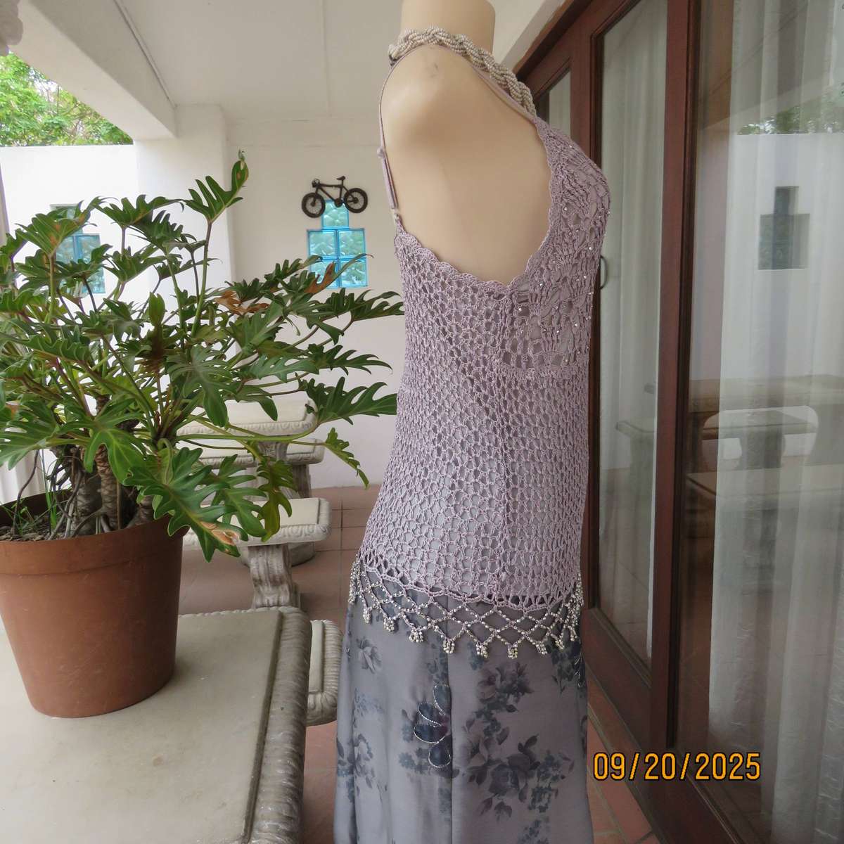 Silvergrey acrylic-nylon crochet top with lining. Adjustable straps. Size 36