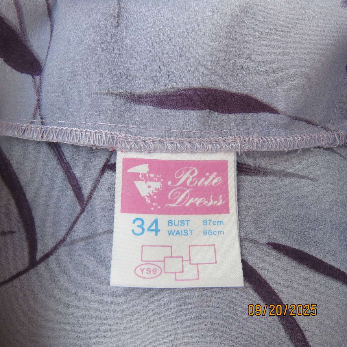 RITE Dress thistle purple top with darker flowers. Button down. Size 34