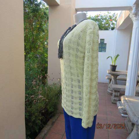 Lemon yellow acrylic knit pullover cardigan knitted in lace stitch with scalloped edging. Size 42