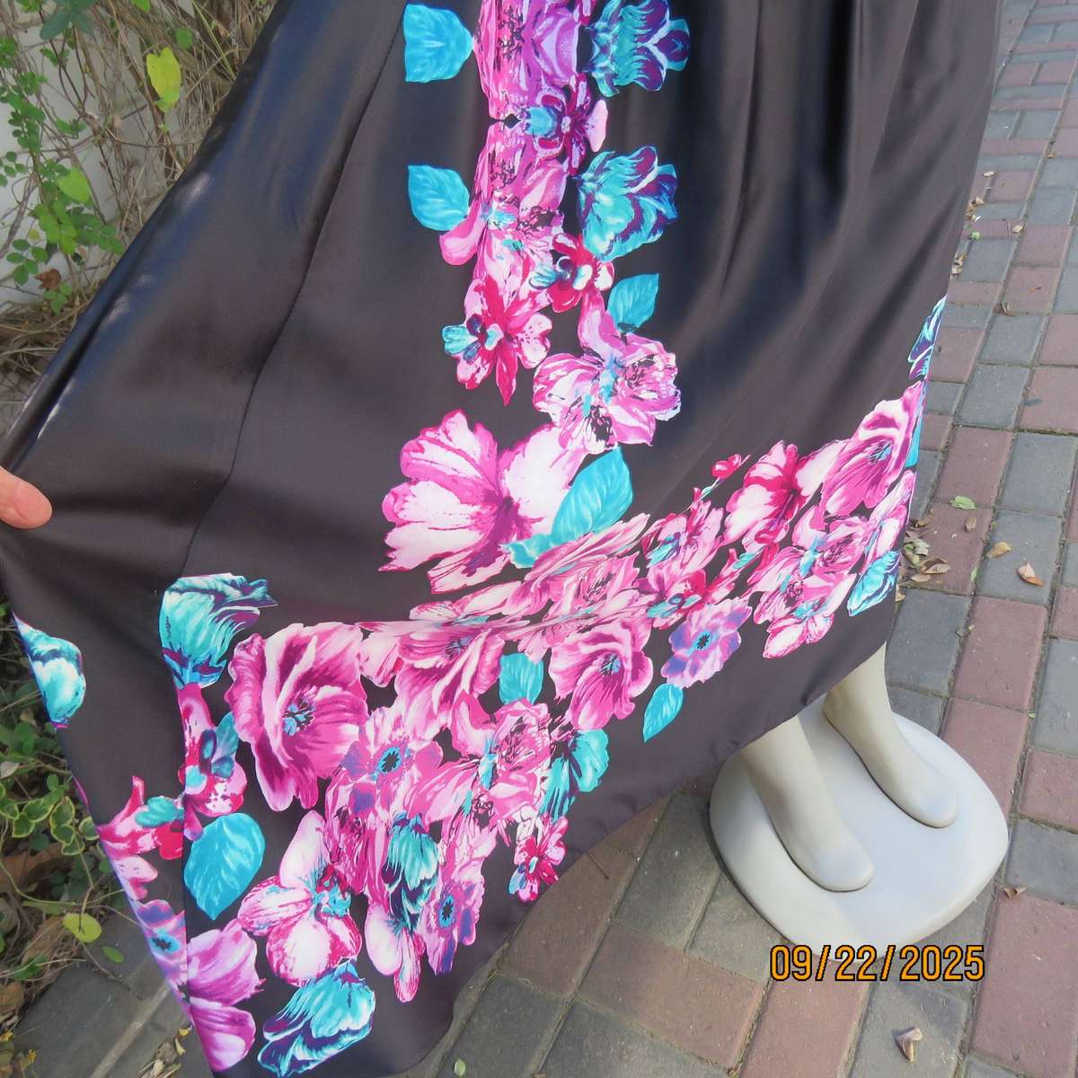 Black silky shiny polyester with pink-jade bold floral print maxi skirt. Elasticated waist. Size 42