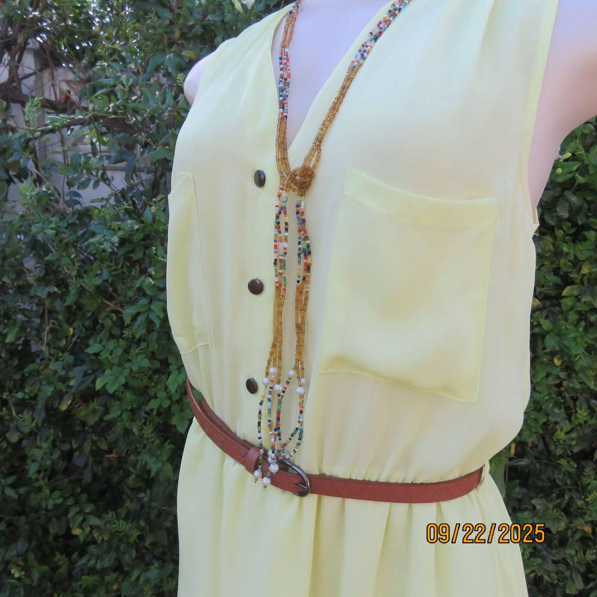 Lemon yellow sheer polyester lined dress with elasticated waist. Size 36