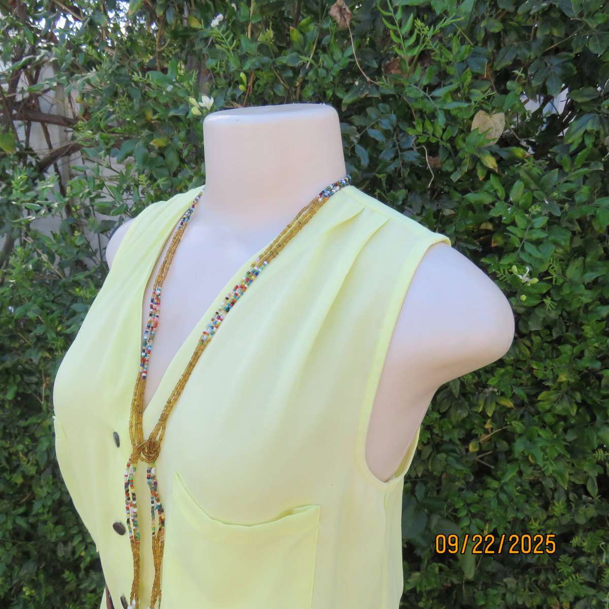 Lemon yellow sheer polyester lined dress with elasticated waist. Size 36