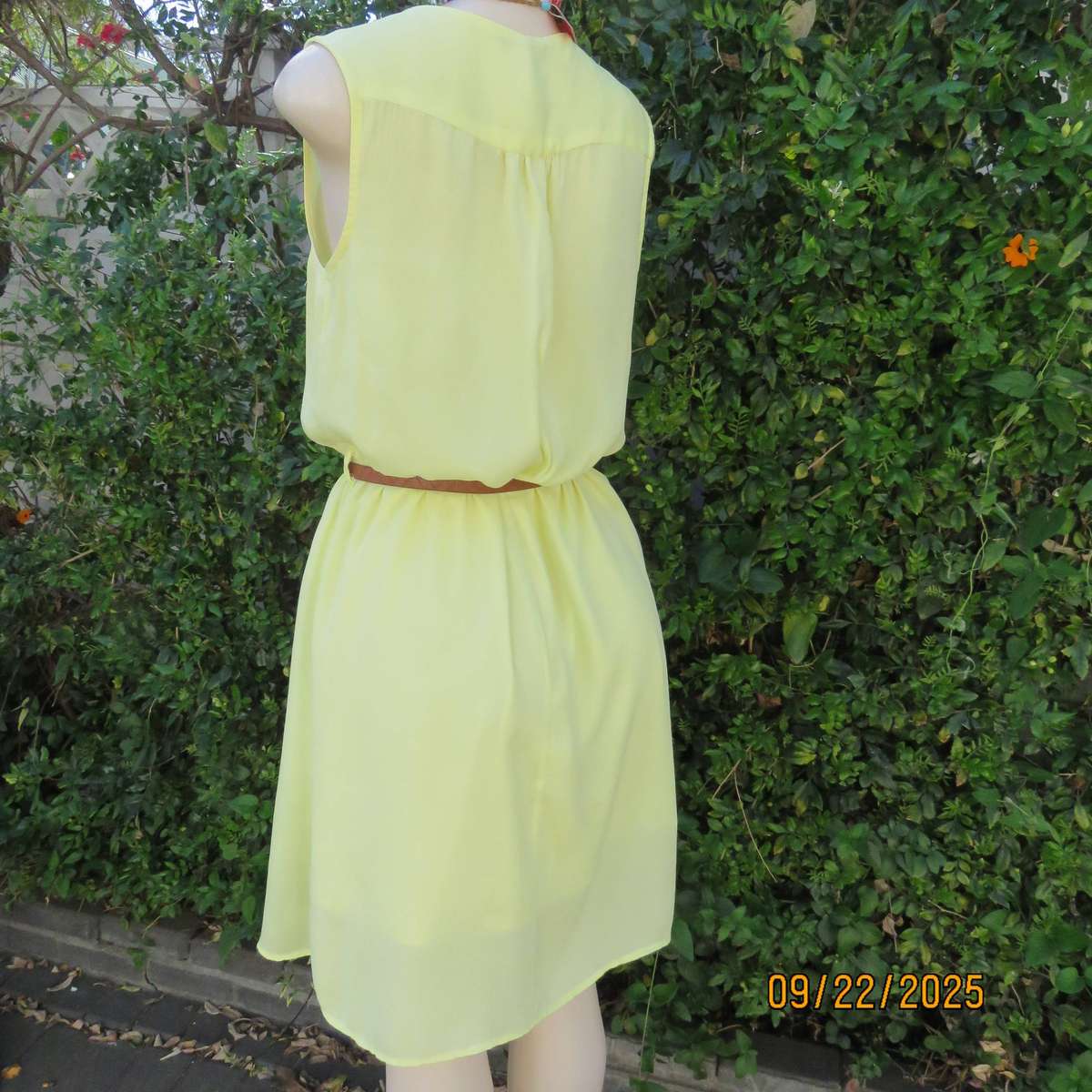 Lemon yellow sheer polyester lined dress with elasticated waist. Size 36