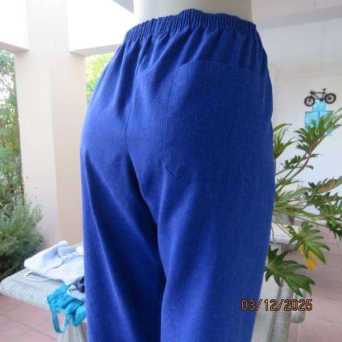 Indigo blue polycotton pants with elasticated waist and 1 pocket. Size 40.